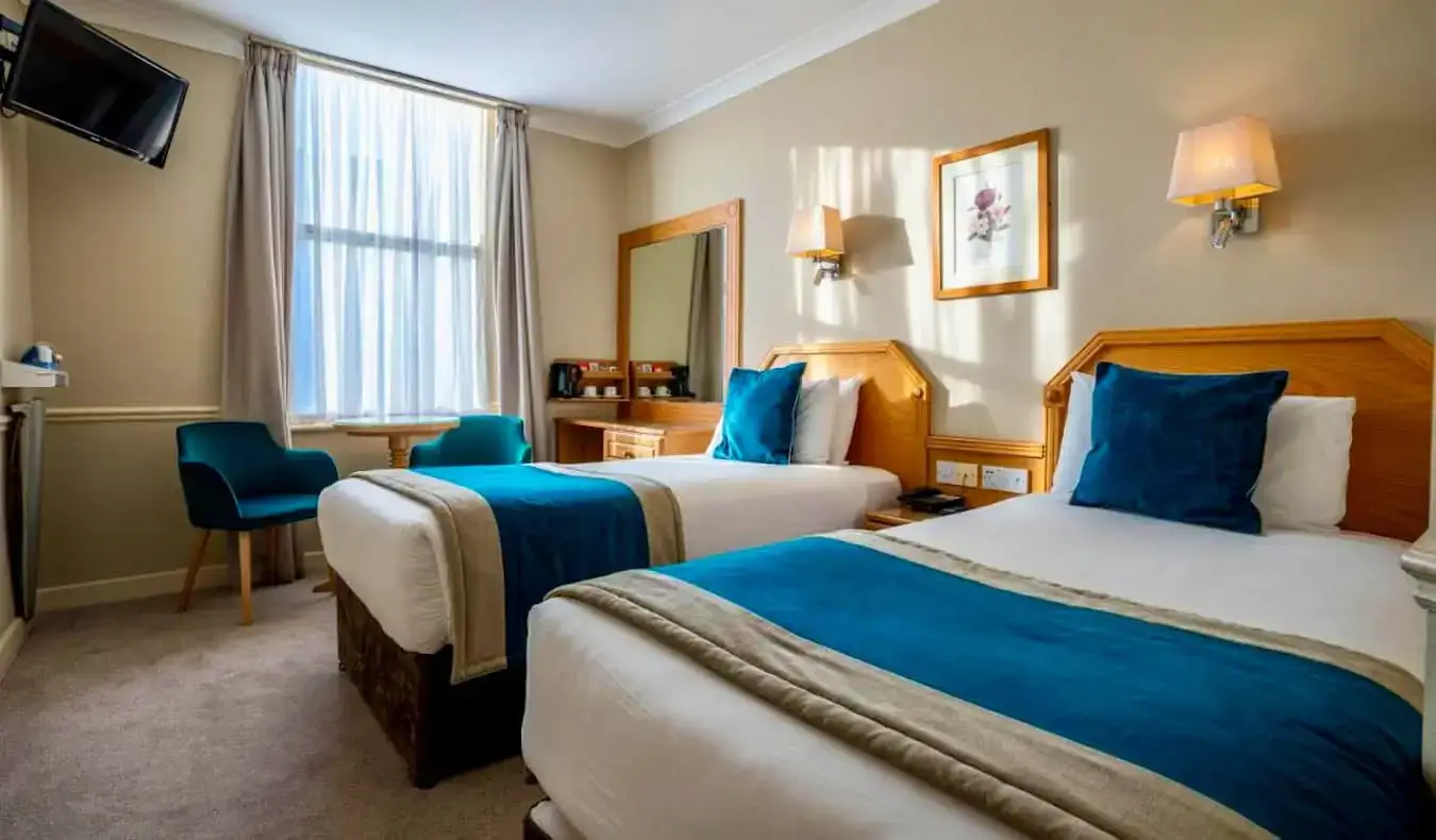 Grote, comfortabele bedden in het Harcourt Hotel in Dublin, Ierland